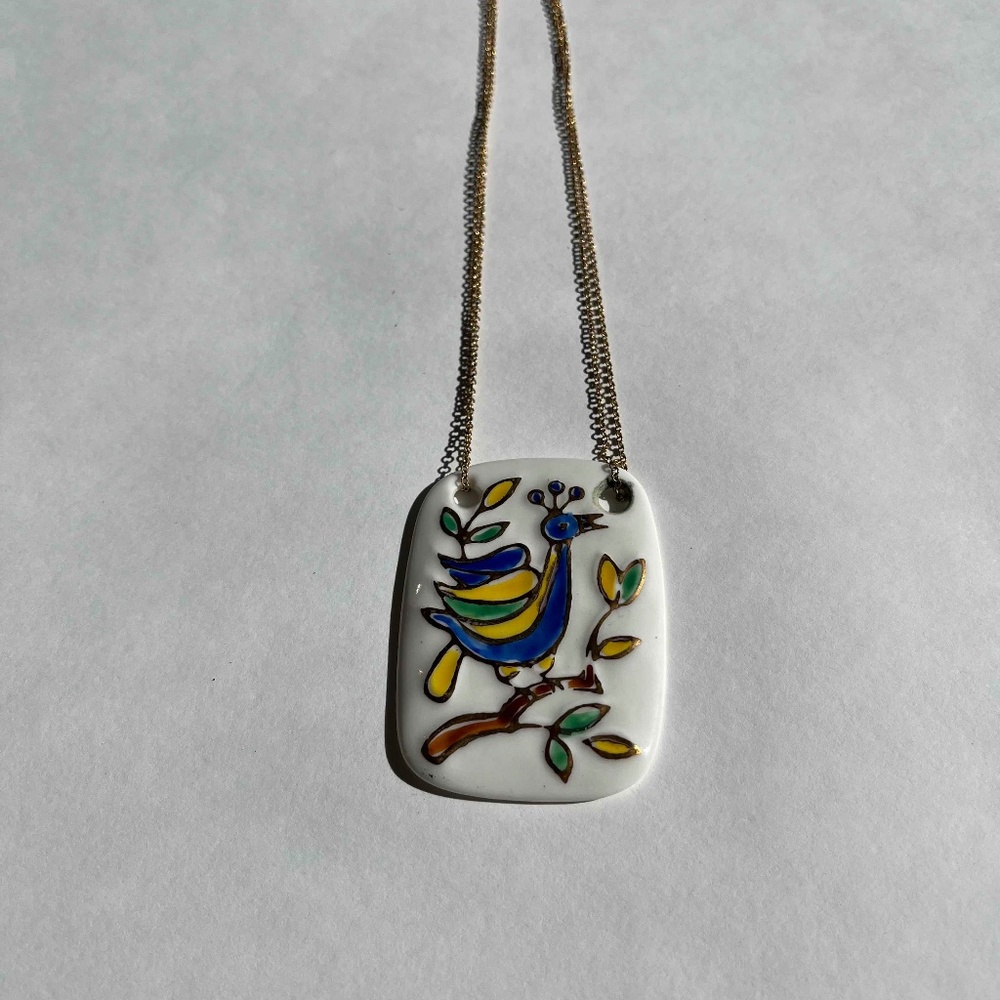 Handmade and handprinted ceramic bird necklace